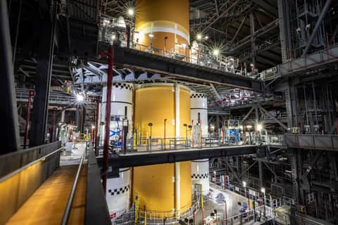 Photo: NASA/Frank Michaux Artemis III SLS core stage stacked with solid rocket boosters in High Bay 3 of the VAB