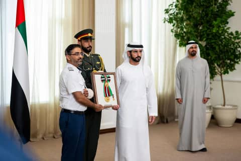 Photo: UAE Presidential Court UAE President with the flydubai FZ1073 crew at the Order of Zayed II ceremony