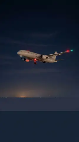 Widebody at night with navigation lights lit
