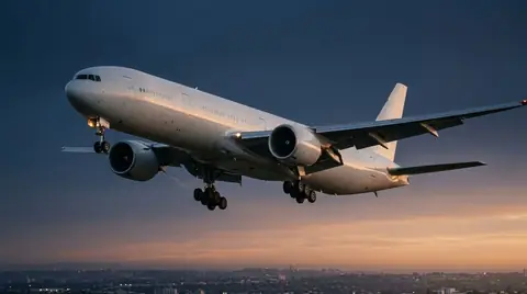 Last shot: widebody on final at dusk